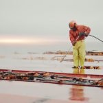 seaman seafarer welder safety protective clothes working with cutting grinding disk machine deck