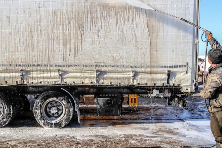 washing large truck with car wash background car service truck washing outdoors closeup car wash with detergents