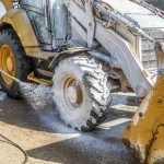 washing wheeled tractor car wash with foam solution