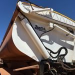 white rear of half clean truck